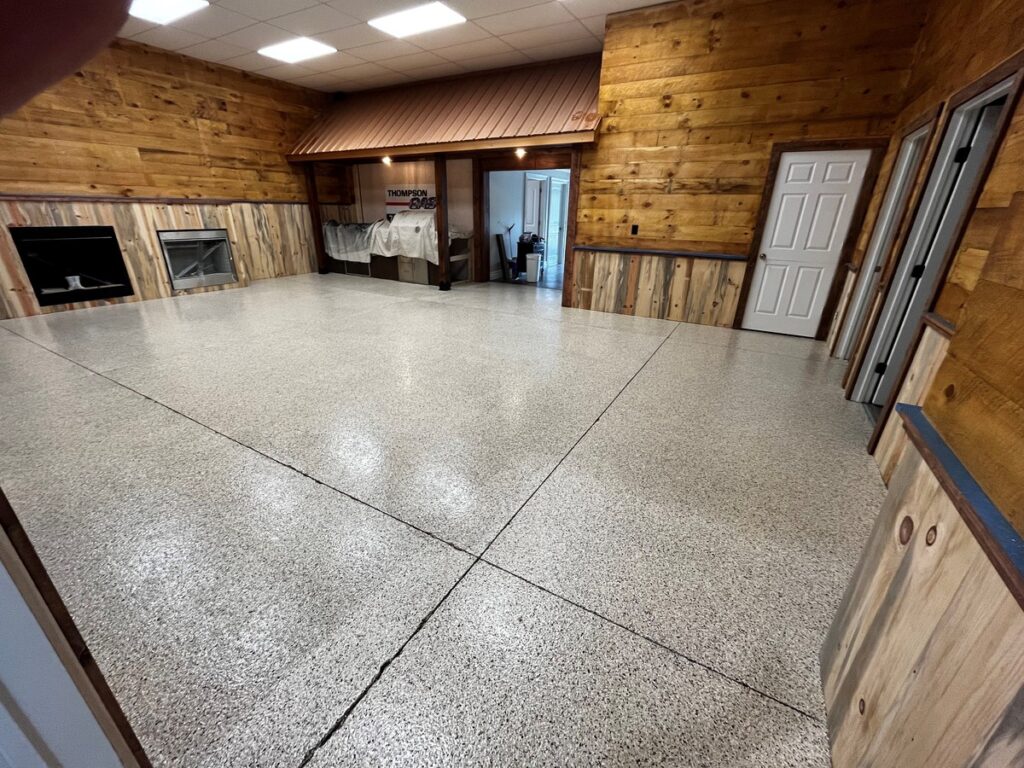 Reimagining Spaces With Epoxy Floors From Ordinary To Showrooms Ssp Coatings Garage Flooring 1664